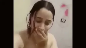 An Egyptian woman takes off all her clothes